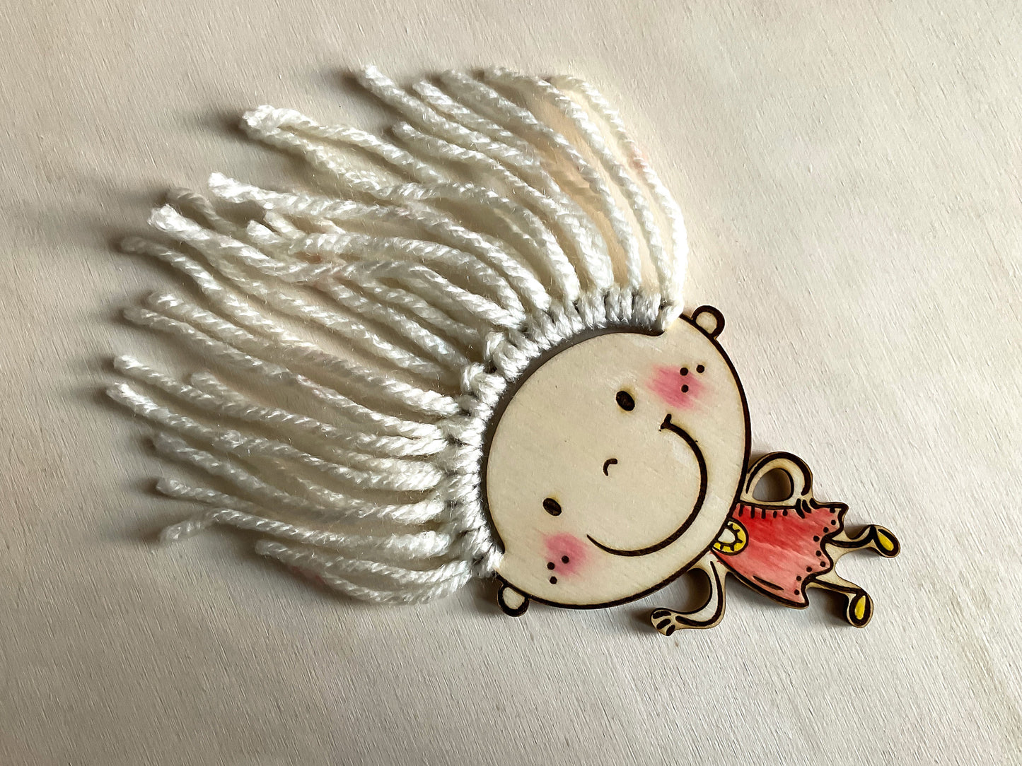 Laser cut figures of kids for adding yarn hair, DIY children faces craft for glowforge