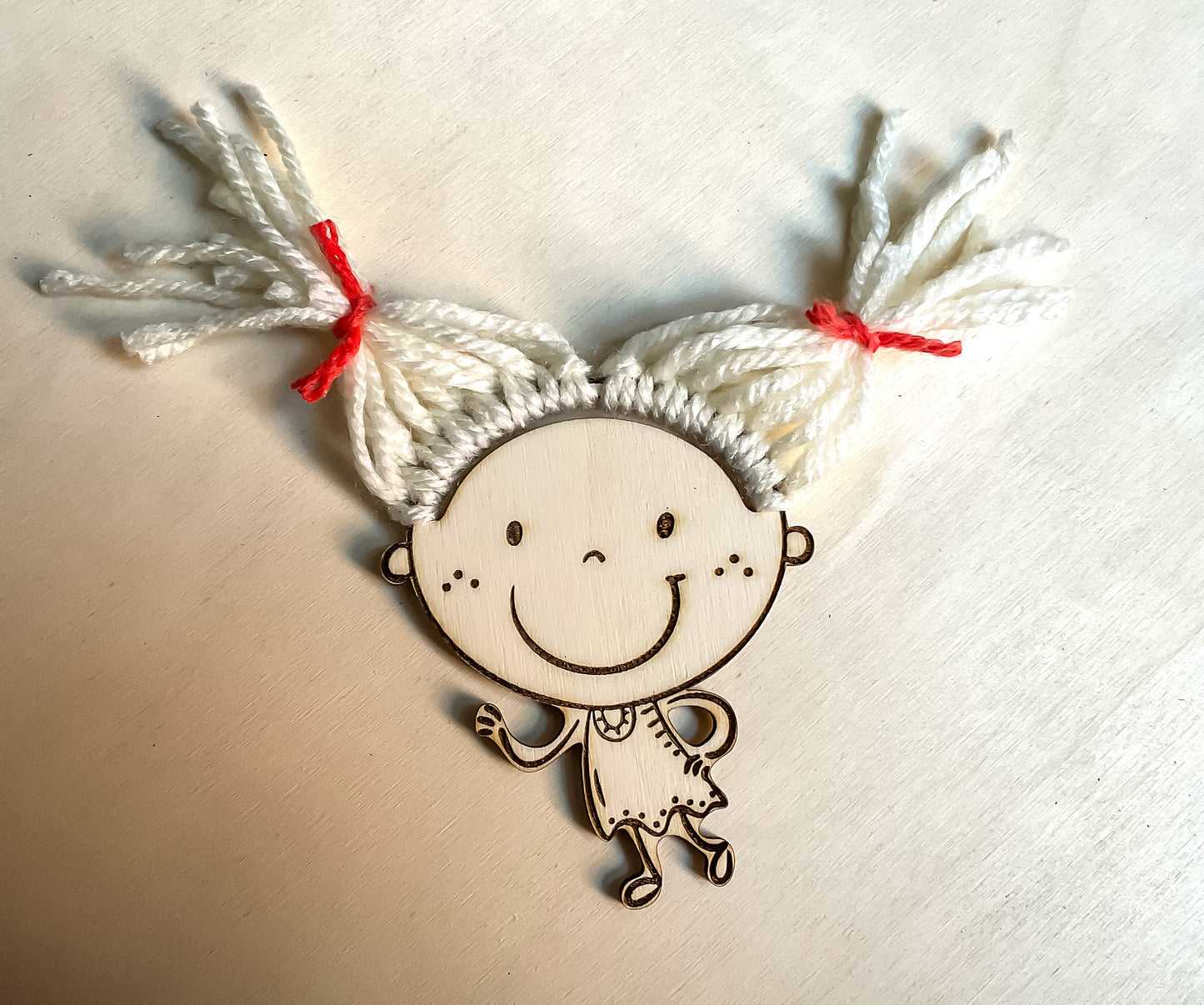 Laser cut figures of kids for adding yarn hair, DIY children faces craft for glowforge
